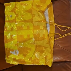 Vintage  DAFFY'S Yellow Plastic Shopping Bag